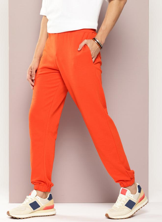 Dillinger Men Orange Solid Joggers - Image 1